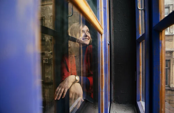 Lovely Blonde Girl Red Jacket Blue Jacket Posing Window Purple — Stock Photo, Image