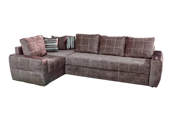 Великий кутовий затишний диван в шоколадному кольорі, зшитий білою ниткою з подушками — стокове фото