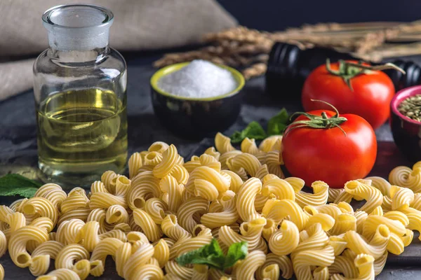 Uncooked Italian Pasta Cavatappi Ingredients Tomato Sauce Dark Background Concept — Stock Photo, Image