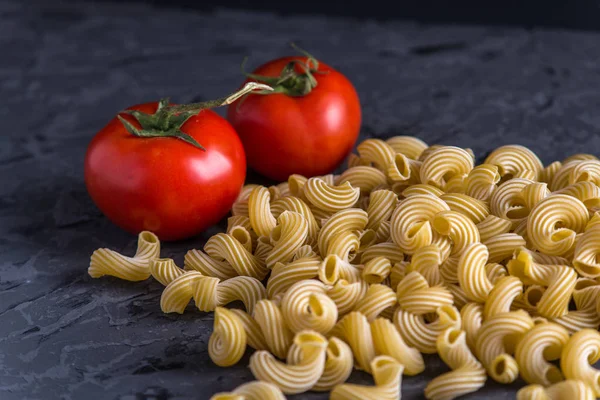 Uncooked Italian Pasta Cavatappi Ingredients Tomato Sauce Dark Background Concept — Stock Photo, Image