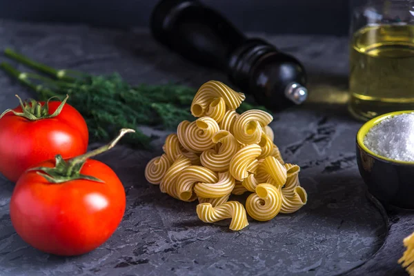 Uncooked Italian Pasta Cavatappi Ingredients Tomato Sauce Dark Background Concept — Stock Photo, Image