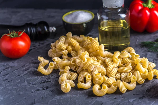 Uncooked Italian Pasta Cavatappi Ingredients Tomato Sauce Dark Background Concept — Stock Photo, Image