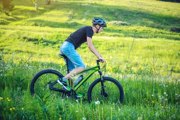 Man Helmet Riding Green Mountain Bike Woods Trees Cyclist Motion — Stock Photo, Image