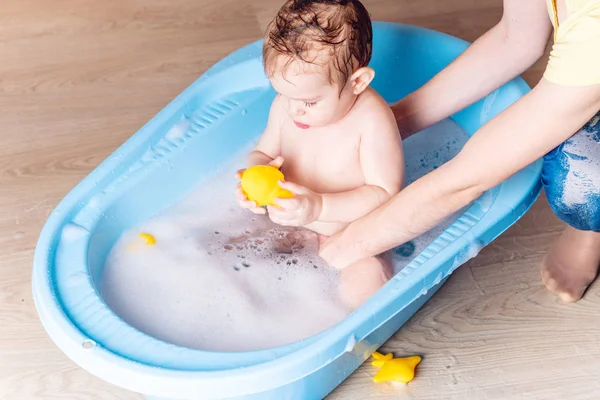Mom Washing Little Boy Blue Bath Bathroom Baby Playing Yellow — Stock Photo, Image