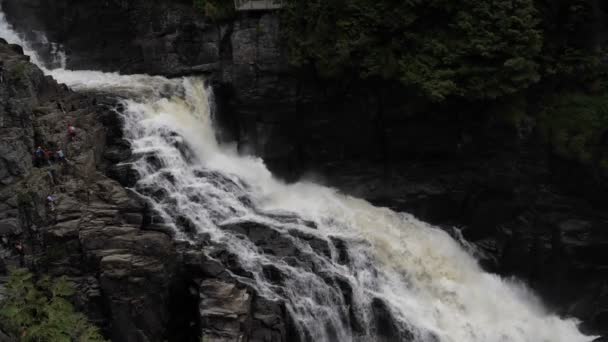 View of waterfall hitting and splash on the surface of hard rocks. Canyon Sainte-Anne — Stock Video