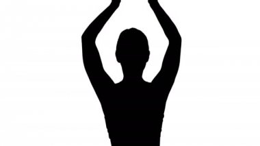 Siluet kadının Yoga lotus poz ile birleştiğinde el yapması.