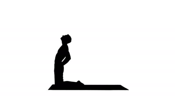 Silhouette sportiga unga mannen arbetande ute, yoga, pilates eller fitness utbildning, stående i asana ushtrasana, Ustrasana eller Camel Pose. — Stockvideo