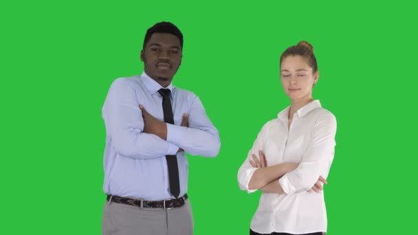 International business people standing with folded arms on a Green Screen, Chroma Key. — Stock Video