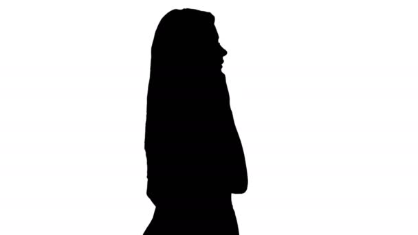 Silhouette ung dam med samtal. — Stockvideo
