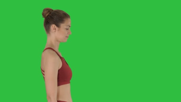 Woman yogi walking on a Green Screen, Chroma Key. — Stock Video