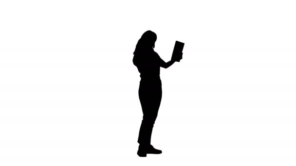 Silhouette Beautiful woman making video call with tablet. — Stock Video