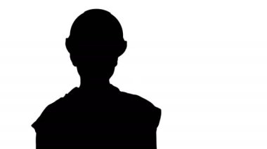 Ayakta ve değişen siluet gülen Oluşturucu işçisi kadın teşkil etmektedir. Eller, kalça, elleri ceplerinde üzerinde kat.