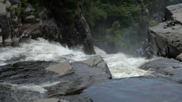 Falling water in mountains — Stock Video