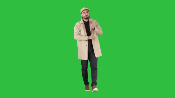 Handsome, attractive, glad, positive in fashinable clothes having a great idea Bingo on a Green Screen, Chroma Key. — Stock Video