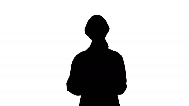 Silhouette Eine junge schöne Wissenschaftlerin in Weiß hält einen Vortrag. — Stockvideo