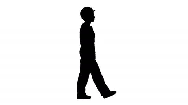 Silhouette Costruttore donna a piedi con le mani in tasca. — Video Stock