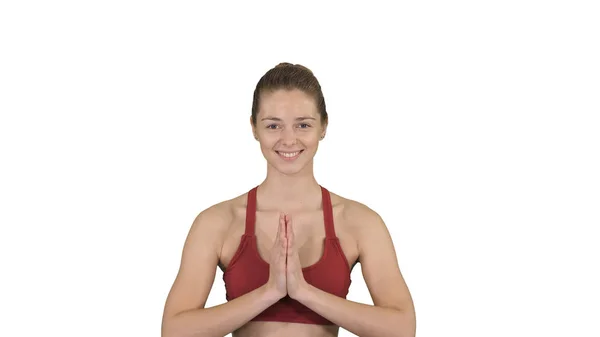 Йога улыбающаяся женщина с руками на белом фоне . — стоковое фото