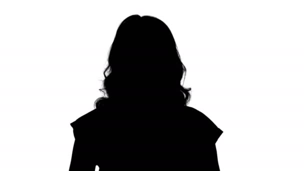 Silhouette Donna bionda che ascolta qualcuno . — Video Stock