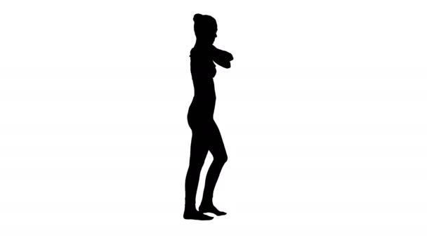 Silhouette Feminine sportswoman stretching her arms during walk. — Stock Video