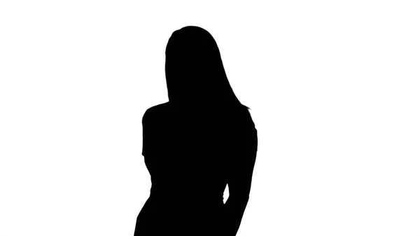 Mooie vrouw in roze jurk glimlachen naar de camera verlegen silhouet, — Stockfoto