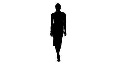 Yürüyüş ve kameraya gülümseyen güzel seksi esmer kadın iş ofis tarzı moda giysiler siluet.