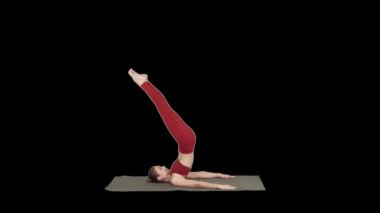 Güzel sporcu kız karın kasları için yoga egzersizleri yapıyor, destekli omuz kasları asana, Salamba Sarvangasana, Alfa Kanalı