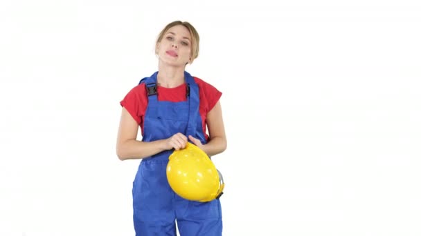 Dont forget to put yellow hard hat on white background. — стоковое видео