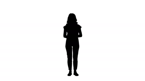 Silhouette Casual charming woman presenter puching imaginary button on imaginary screen. — Stock Video