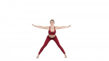 İleri asana yoga poz beyaz arka plan üzerinde bükme genç kadın.