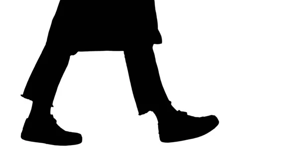 Silhouette Woman doctor legs walking. — Stock Photo, Image