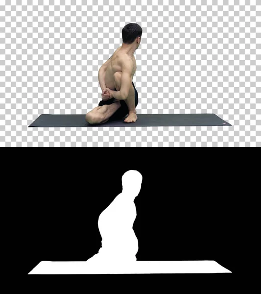 Man practice yoga Sage Twist C pose or Marichyasana pose stretching exercise muscle with yoga meditation relax and refresh health, Alpha Channel