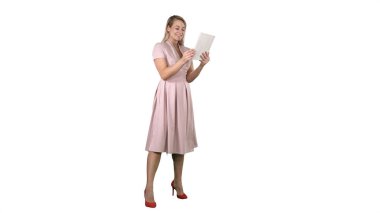Single girl making a video call on her tablet side view full lenth on white background. clipart