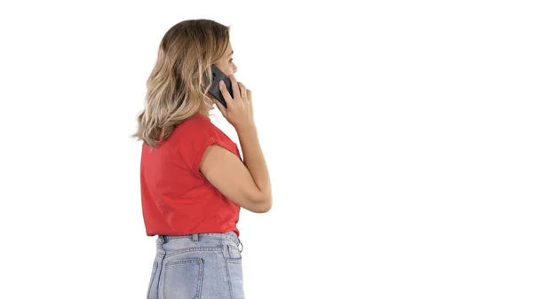 Mujer hablando por teléfono sobre fondo blanco. — Foto de Stock