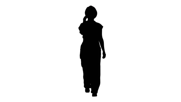 Silhouette Femme de construction faisant un appel. — Photo