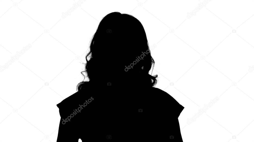 Silhouette Blonde woman listening to someone.