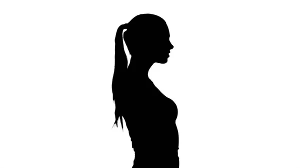 Silhouette Belle et élégante femme d'affaires hispanique marche et sourit . — Photo