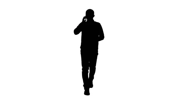 Silhouette Young man talking on mobilephone. — Stock Photo, Image