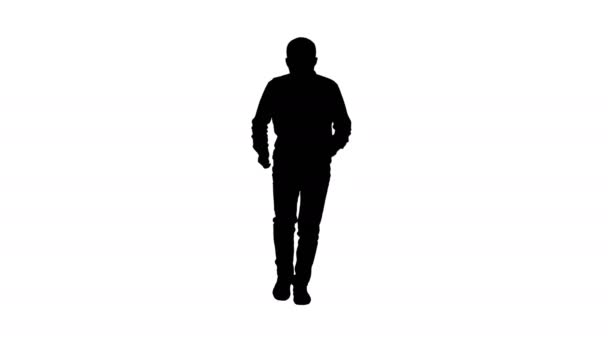 Silhouette Giovane uomo in un vestito casual camminare e ballare. — Video Stock