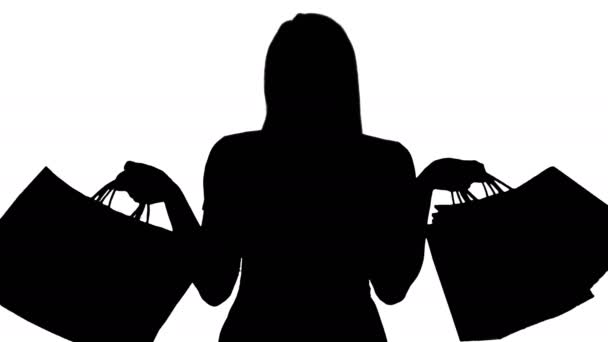 Orta Boy Siluet Heyacanlı Genç Bayan Ayakta Duruyor Alışveriş Torbalarını — Stok video