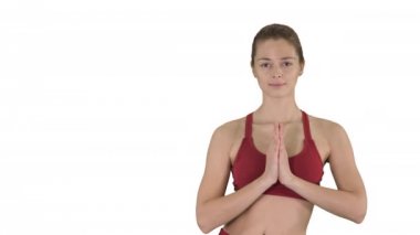Genç kadın Yoga egzersiz Utthita Hasta Padangustasana beyaz arka plan üzerinde yapmak.