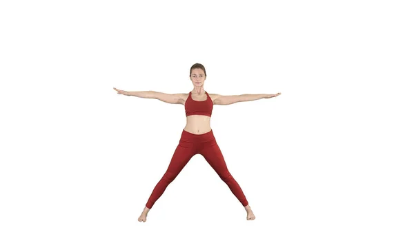 Mujer joven en flexión hacia adelante pose asana yoga sobre fondo blanco . —  Fotos de Stock