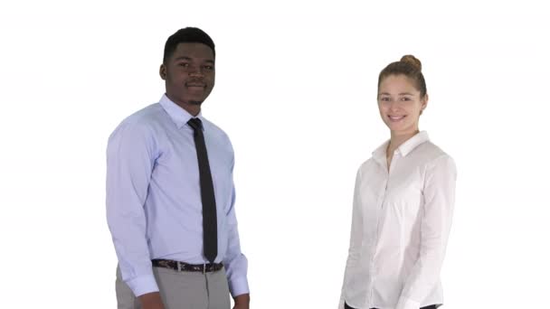 International happy smiling man and woman showing thumbs up on white background. — Stock Video