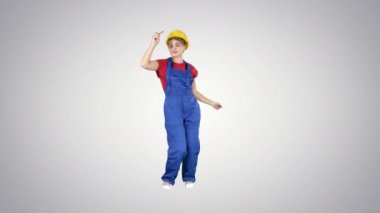 Tradeswoman dans eden inşaat düzgün giyimli kadın degrade arka plan üzerinde.
