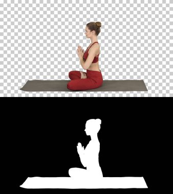 Genç sportif çekici kadın yoga yapıyor, Lotus pozu veriyor, Alfa Kanalı.
