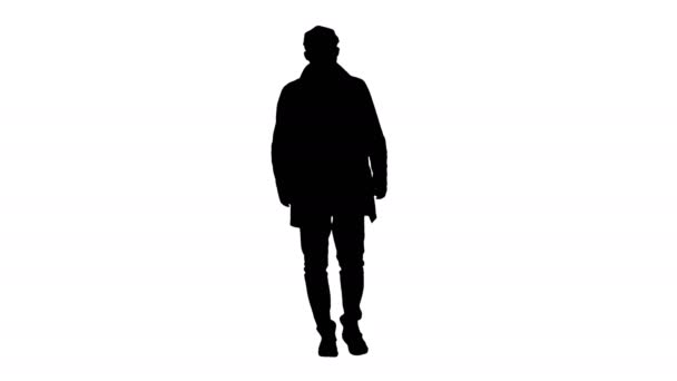 Silhouette Homme à la barbe foncée dans les promenades de trench-coat léger. — Video