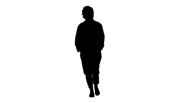 Silhouet Serieuze blanke jonge vrouw in uniform lopen. — Stockvideo