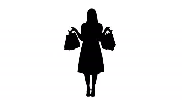 Silhouette Woman with shopping bags in pink dress standing. — Stock Video