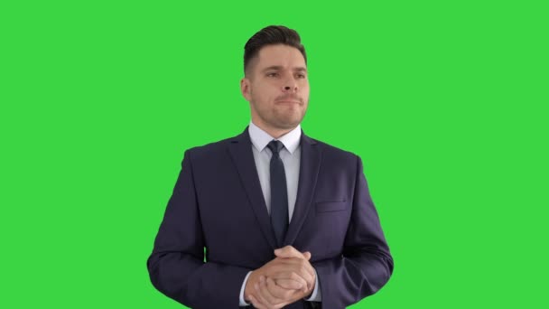 Obchodník pozorně naslouchal svému kolegovi na zelené obrazovce, Chroma Key. — Stock video