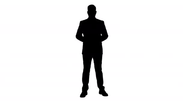 Silhouette Geschäftsmann zeigt mit erhobenem Zeigefinger einen Akzent. — Stockvideo