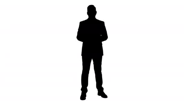 Silhouette Man in formal clother with a headset presenting something. — Stock Video